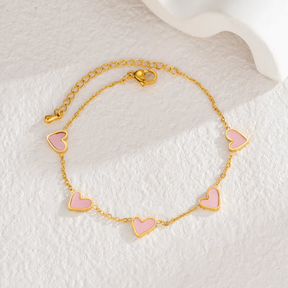 Pulsera de acero inoxidable chapado en oro de tendencia para mujeres con diseño de corazón con gotas de aceite multicolor
