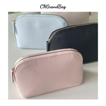 Bolsa de cosméticos de cuero sintético con letras personalizadas, clásica, sencilla, de color liso, con cremallera avanzada.