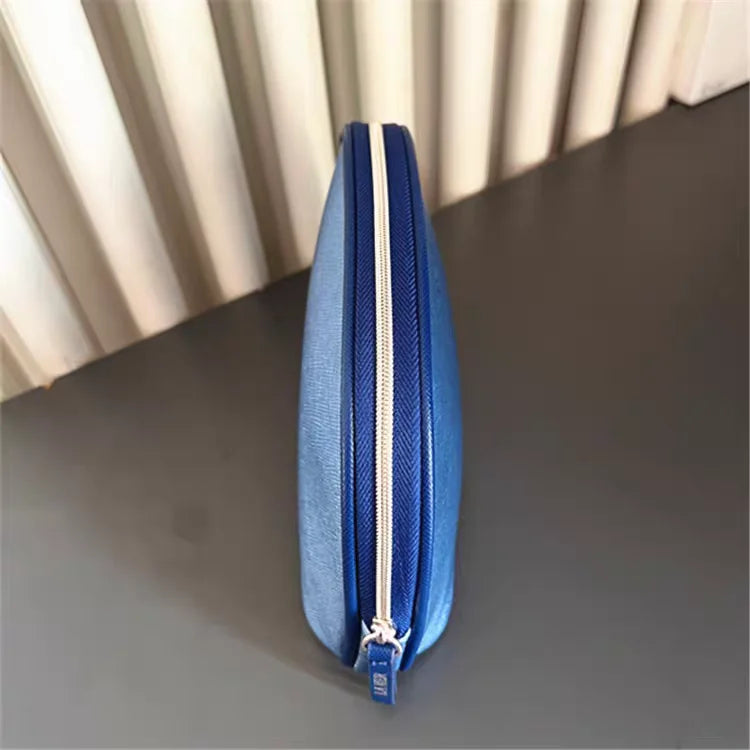 Bolsa de viaje portátil azul marino, una bolsa de mano de material PU de color puro, bolsa de almacenamiento fácil de llevar para artículos personales
