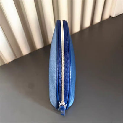 Bolsa de viaje portátil azul marino, una bolsa de mano de material PU de color puro, bolsa de almacenamiento fácil de llevar para artículos personales