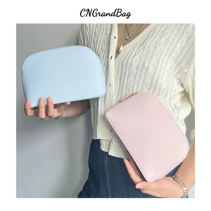Bolsa de cosméticos de cuero sintético con letras personalizadas, clásica, sencilla, de color liso, con cremallera avanzada.
