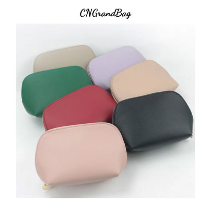 Bolsa de cosméticos de cuero sintético con letras personalizadas, clásica, sencilla, de color liso, con cremallera avanzada.