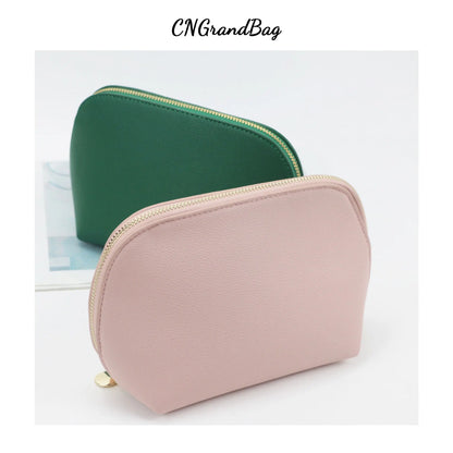 Bolsa de cosméticos de cuero sintético con letras personalizadas, clásica, sencilla, de color liso, con cremallera avanzada.